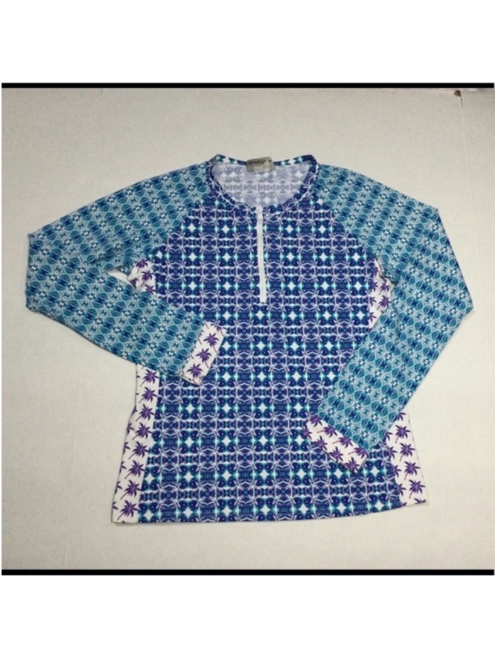 Tommy Bahama RashGuard
Small
